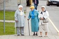 Aged senior women walking on the street